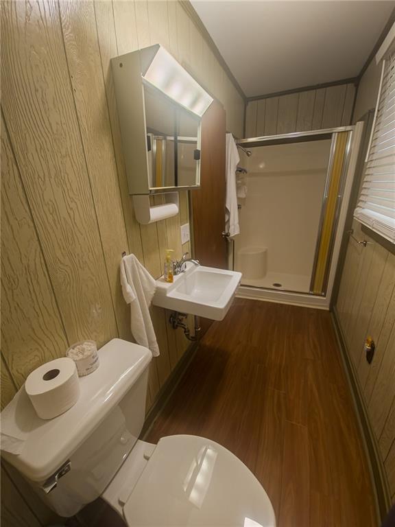 67 Dixie Park Drive Northwest Rome, GA 30165 - Photo 17 of 27 a bathroom with a sink a toilet a mirror and shower
