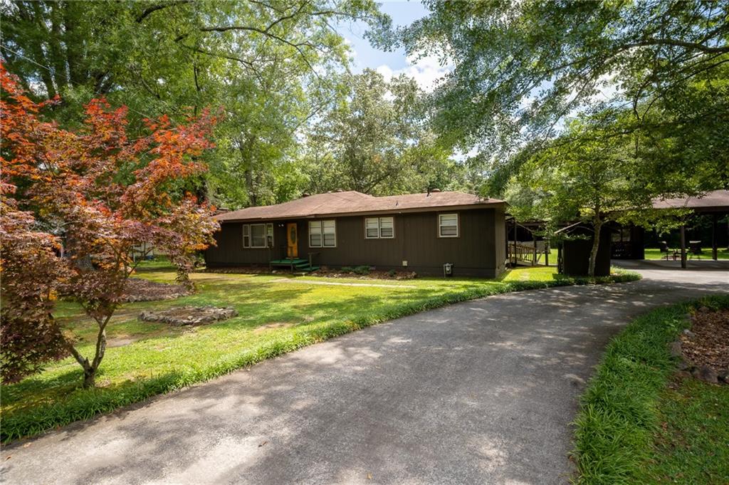 67 Dixie Park Drive Northwest Rome, GA 30165 - Photo 2 of 27 a front view of house with yard and green space