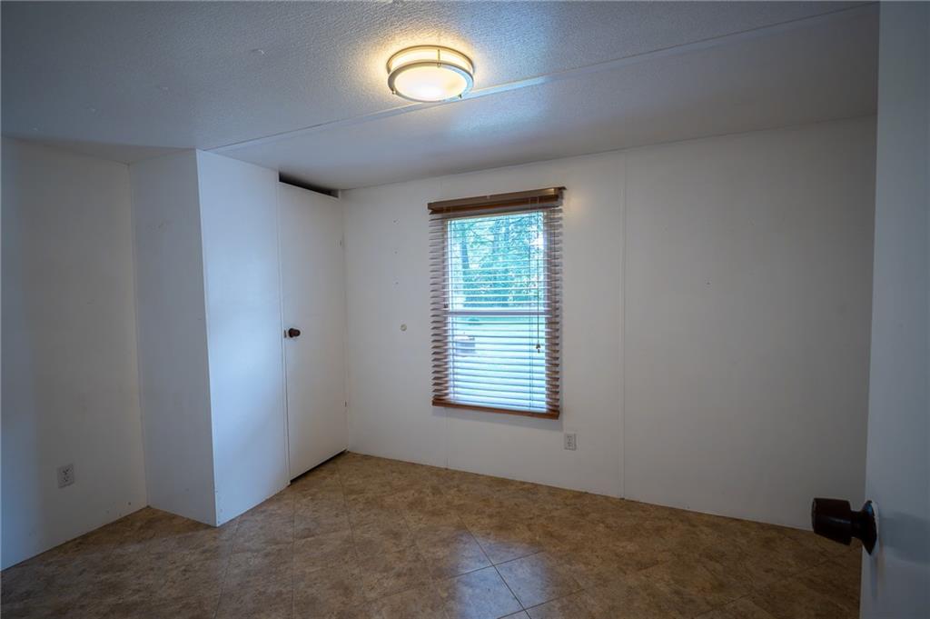 67 Dixie Park Drive Northwest Rome, GA 30165 - Photo 25 of 27 an empty room with a window