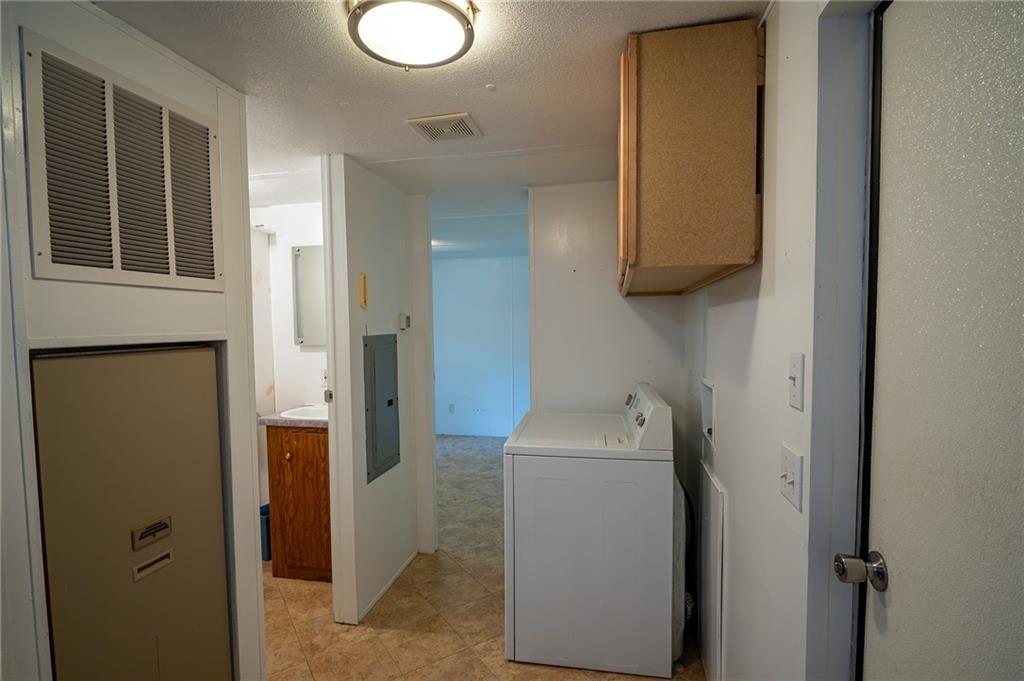 67 Dixie Park Drive Northwest Rome, GA 30165 - Photo 27 of 27 a bathroom with a sink and a mirror