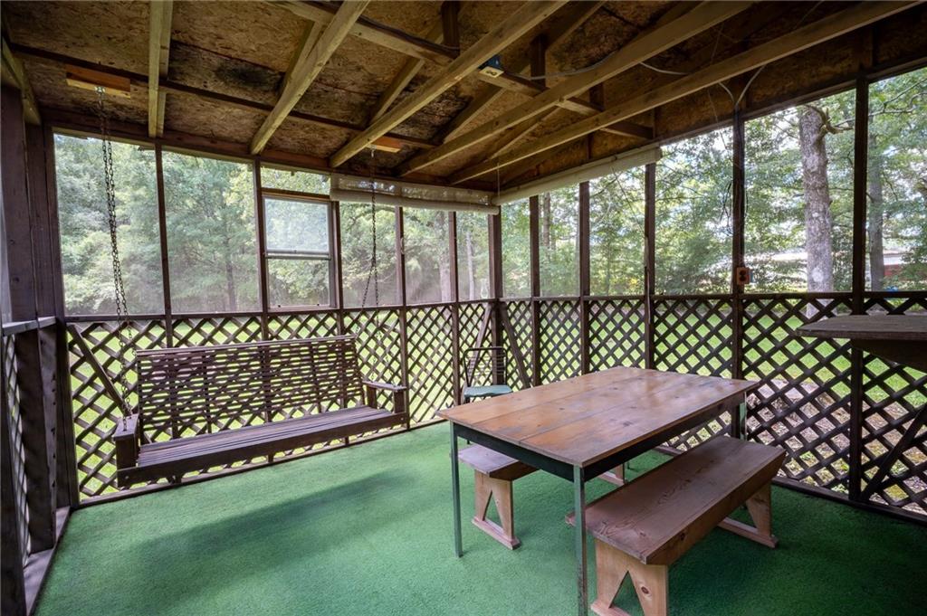 67 Dixie Park Drive Northwest Rome, GA 30165 - Photo 6 of 27 a view of a chairs and table in the patio