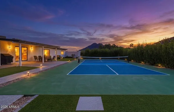 a view of outdoor space and tennis court