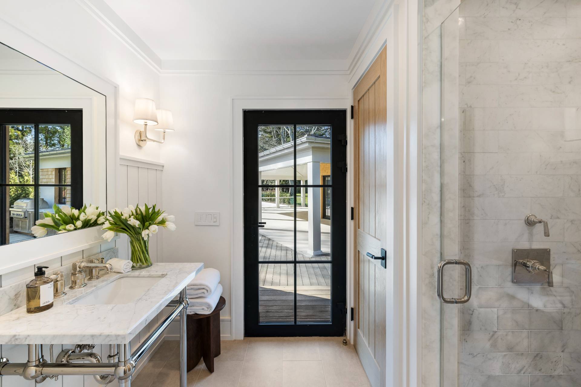 104 Georgica Close Road East Hampton, NY 11937 - Photo 21 of 46 a bathroom with a sink and a mirror