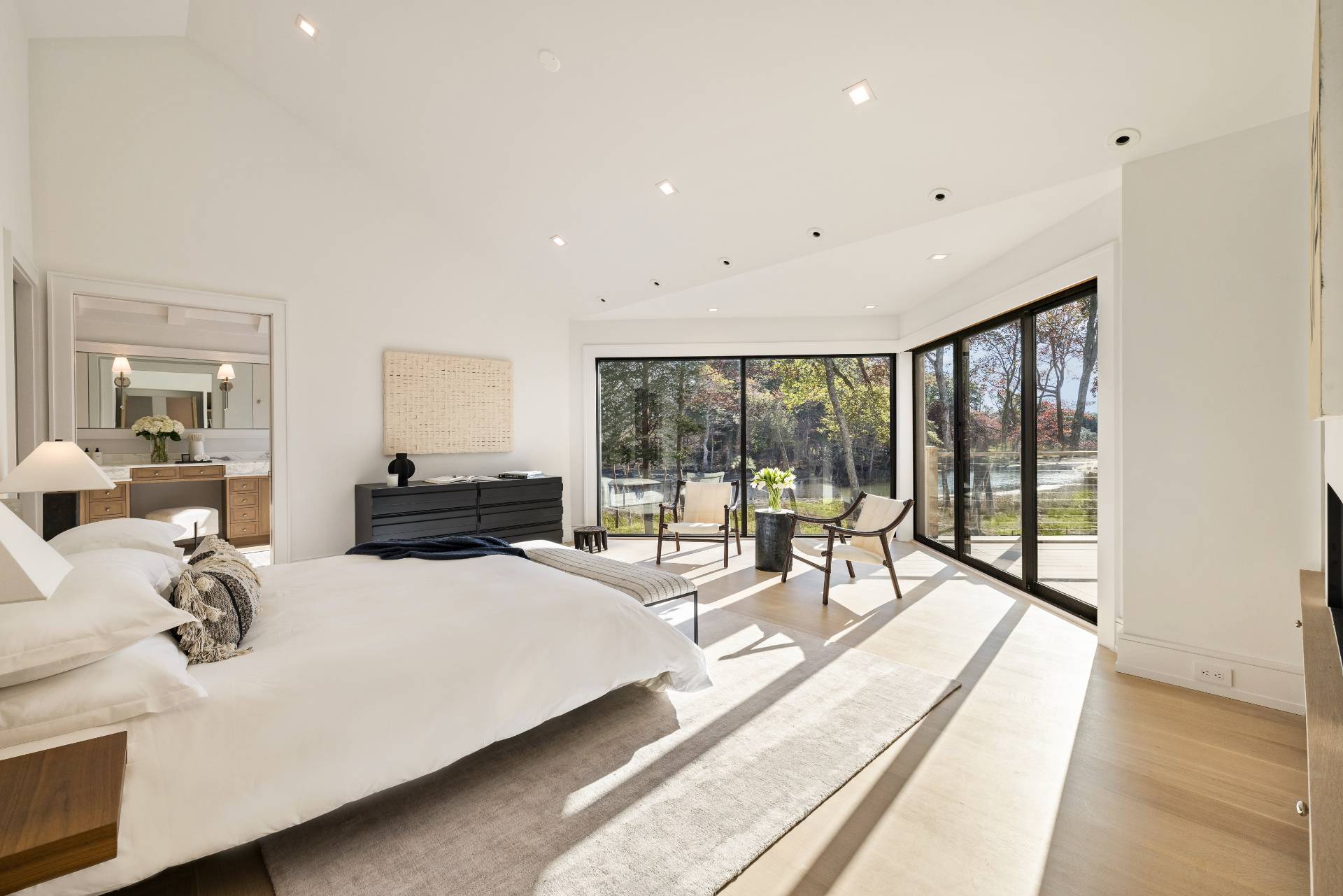 104 Georgica Close Road East Hampton, NY 11937 - Photo 26 of 46 a living room with furniture and a large window