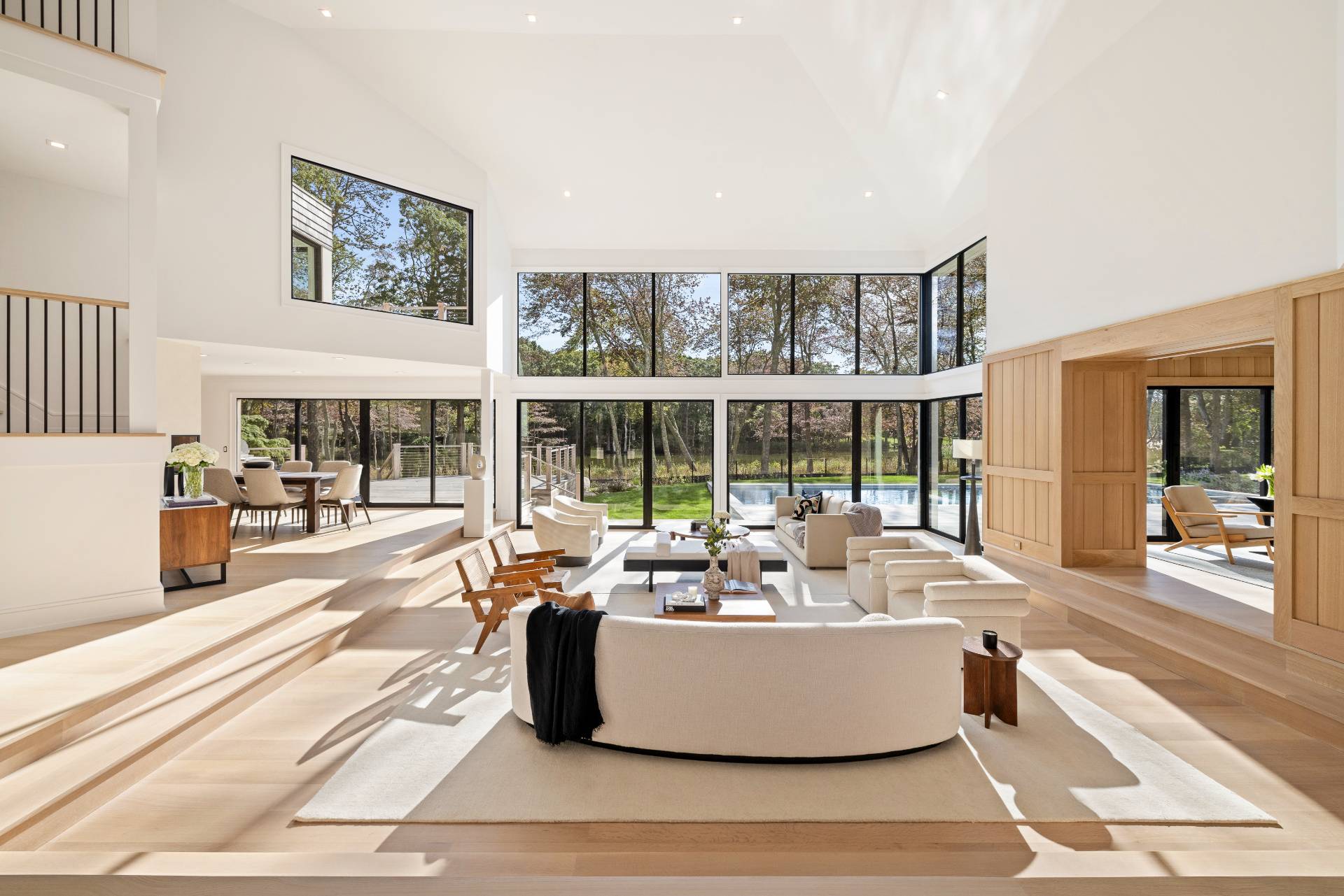 104 Georgica Close Road East Hampton, NY 11937 - Photo 5 of 46 a living room with furniture and large windows