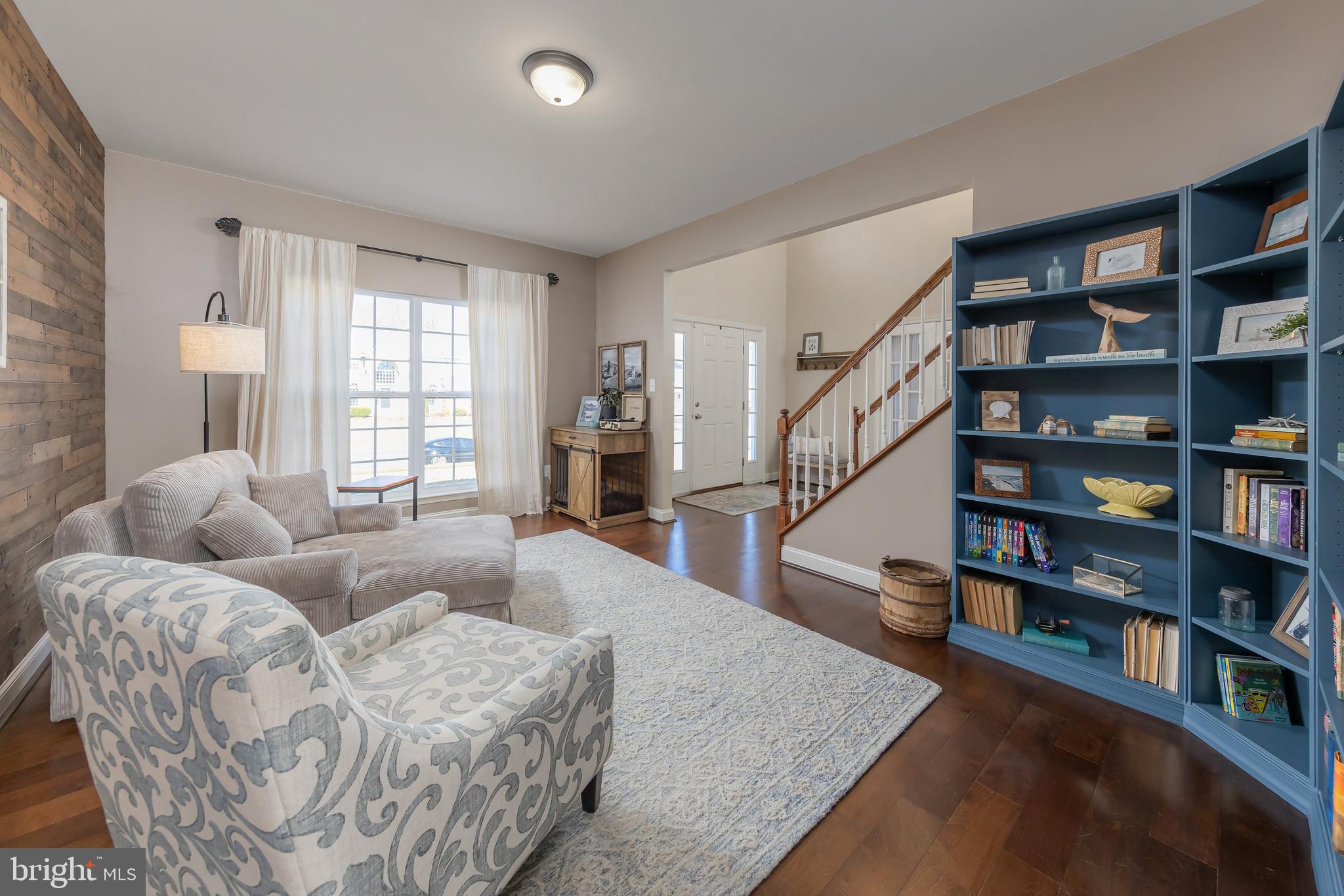 112 Robert Botto Way Clarksboro, NJ 08020 - Photo 12 of 60 a living room with furniture and a book shelf