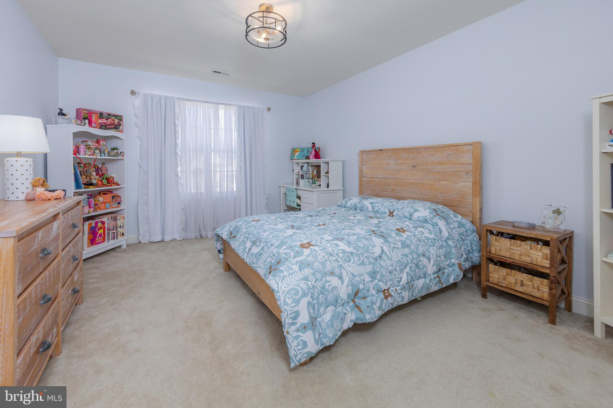 112 Robert Botto Way Clarksboro, NJ 08020 - Photo 23 of 60 a bedroom with a bed and a couch