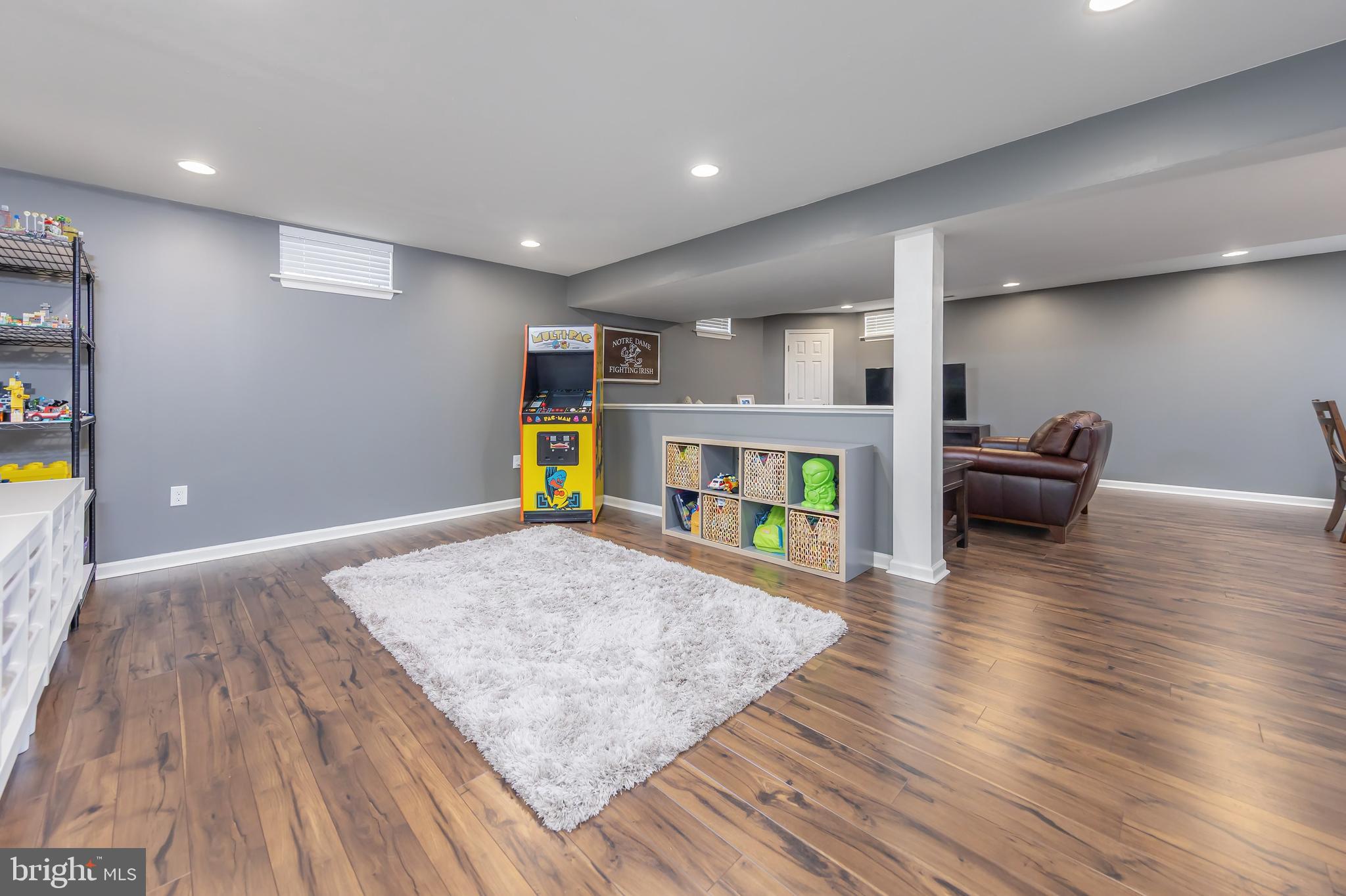 112 Robert Botto Way Clarksboro, NJ 08020 - Photo 28 of 60 a living room with furniture and a wooden floor