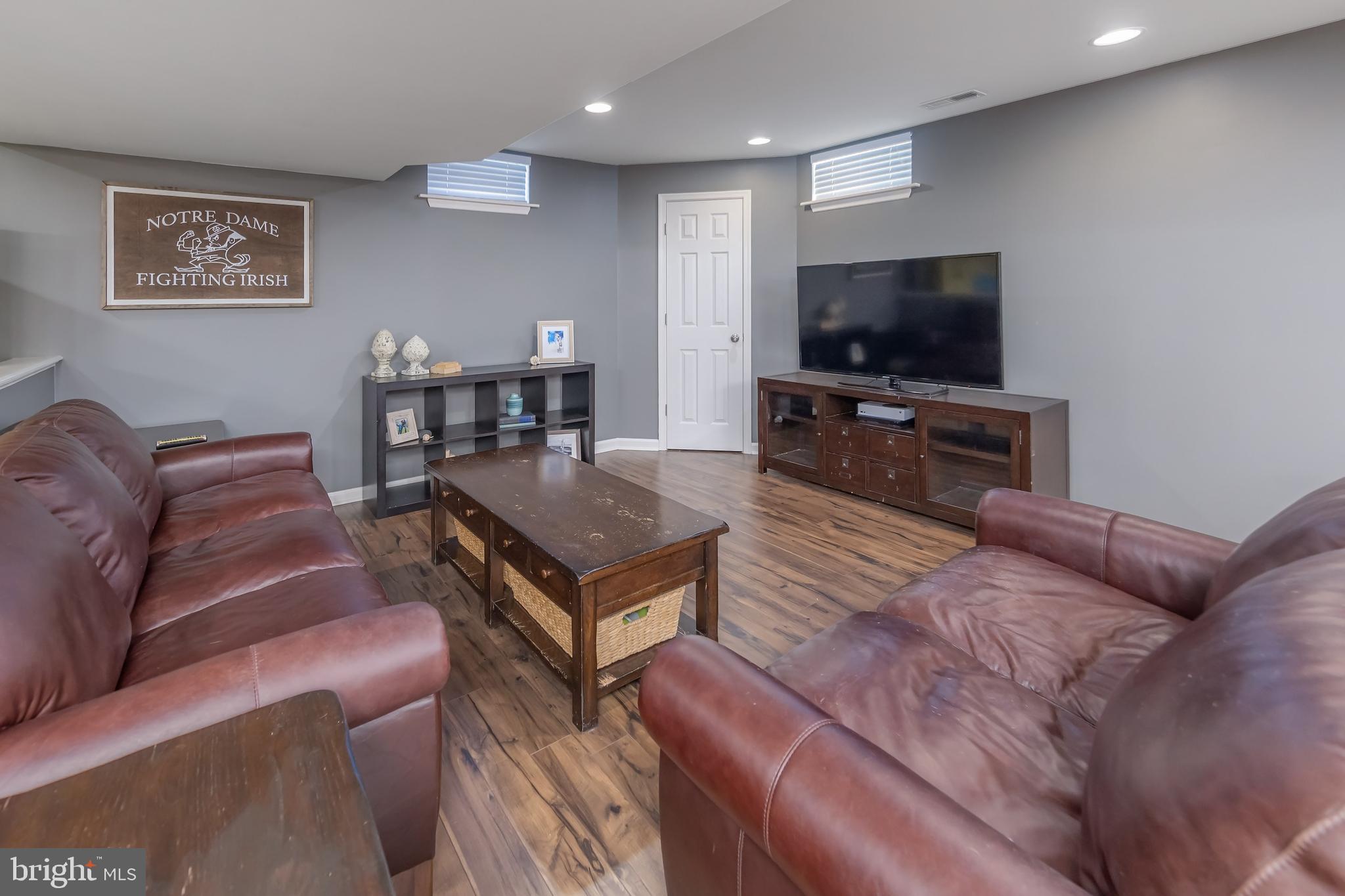 112 Robert Botto Way Clarksboro, NJ 08020 - Photo 29 of 60 a living room with furniture and a flat screen tv