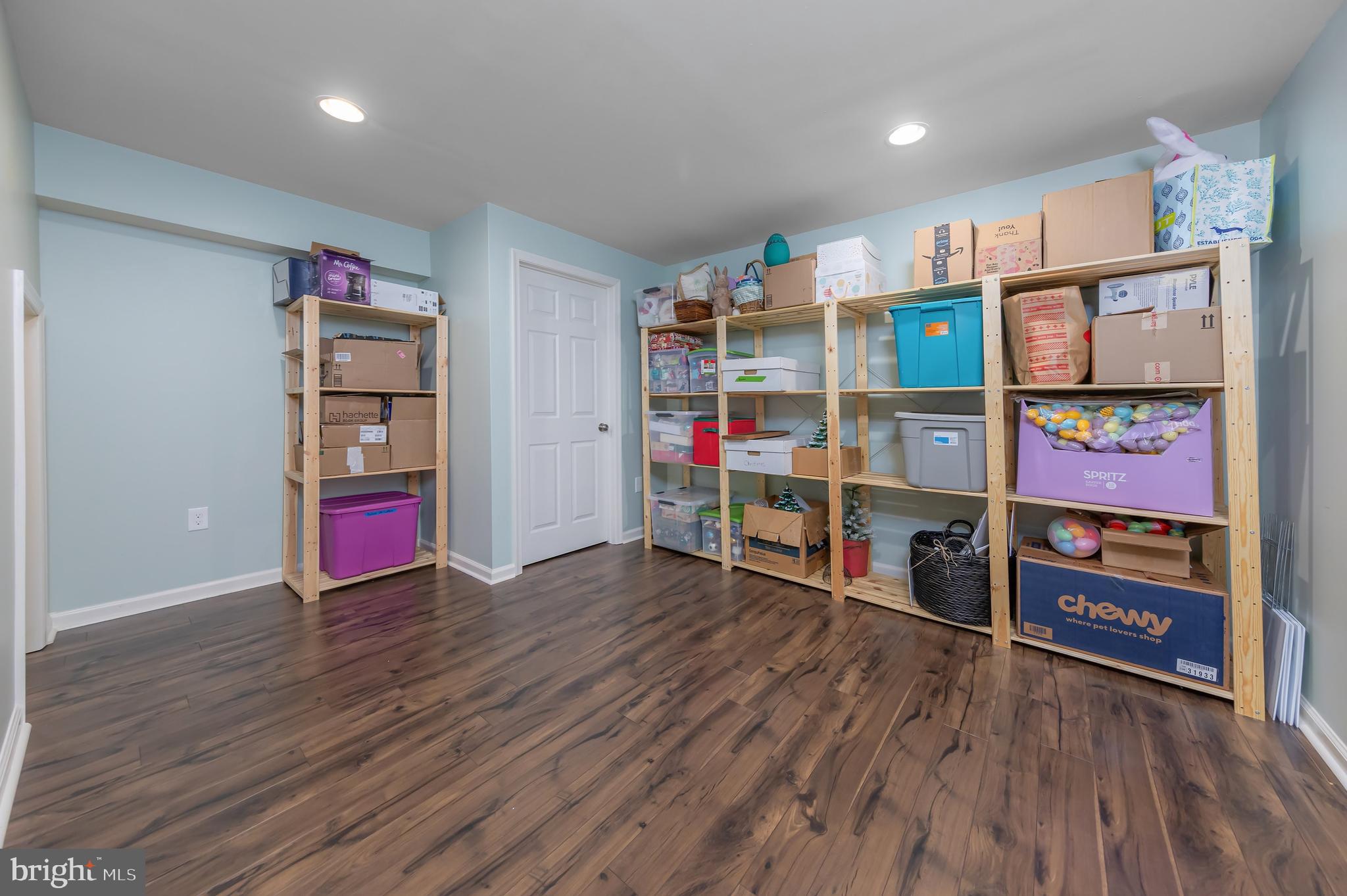 112 Robert Botto Way Clarksboro, NJ 08020 - Photo 30 of 60 a room with wooden floor and bookshelf