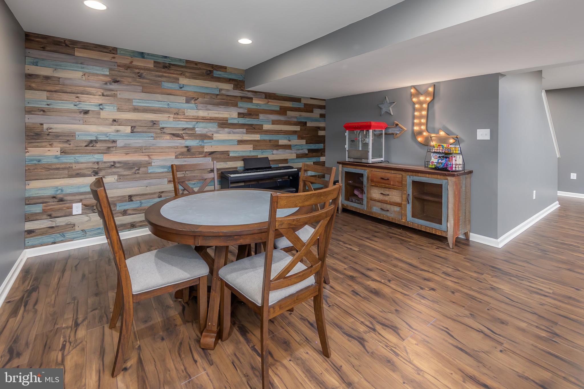 112 Robert Botto Way Clarksboro, NJ 08020 - Photo 31 of 60 a room with stainless steel appliances wooden floors and wooden cabinets