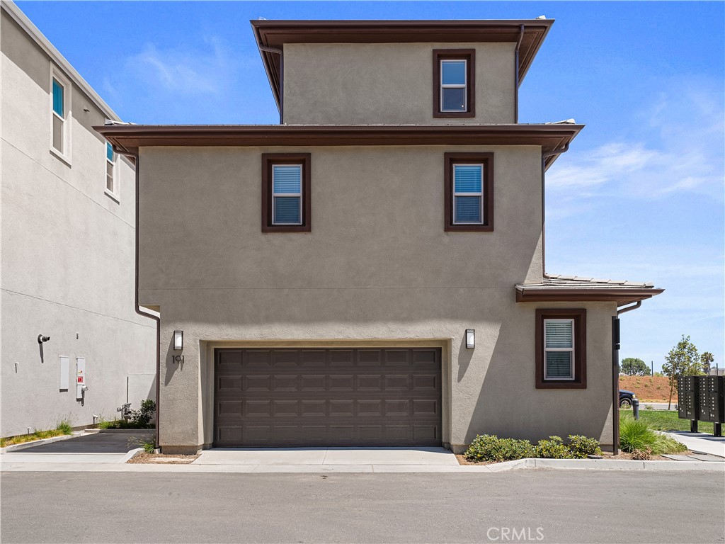 191 Lynx Irvine, CA 92618 - Photo 26 of 26 a front view of a house with garage