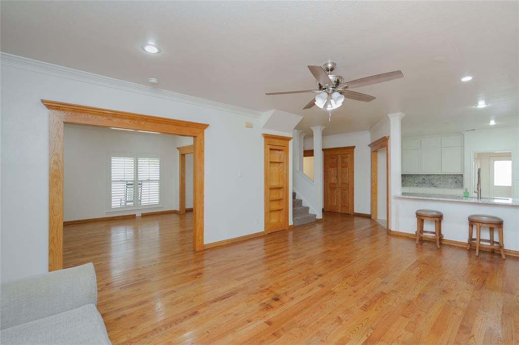 364 Parker Road, Unit A Van Alstyne, TX 75495 - Photo 11 of 39 Spacious living area featuring wood-finish flooring, recessed lighting, and a ceiling fan
