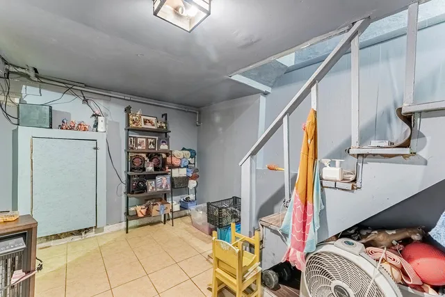 a living room with a couch and a flat screen tv