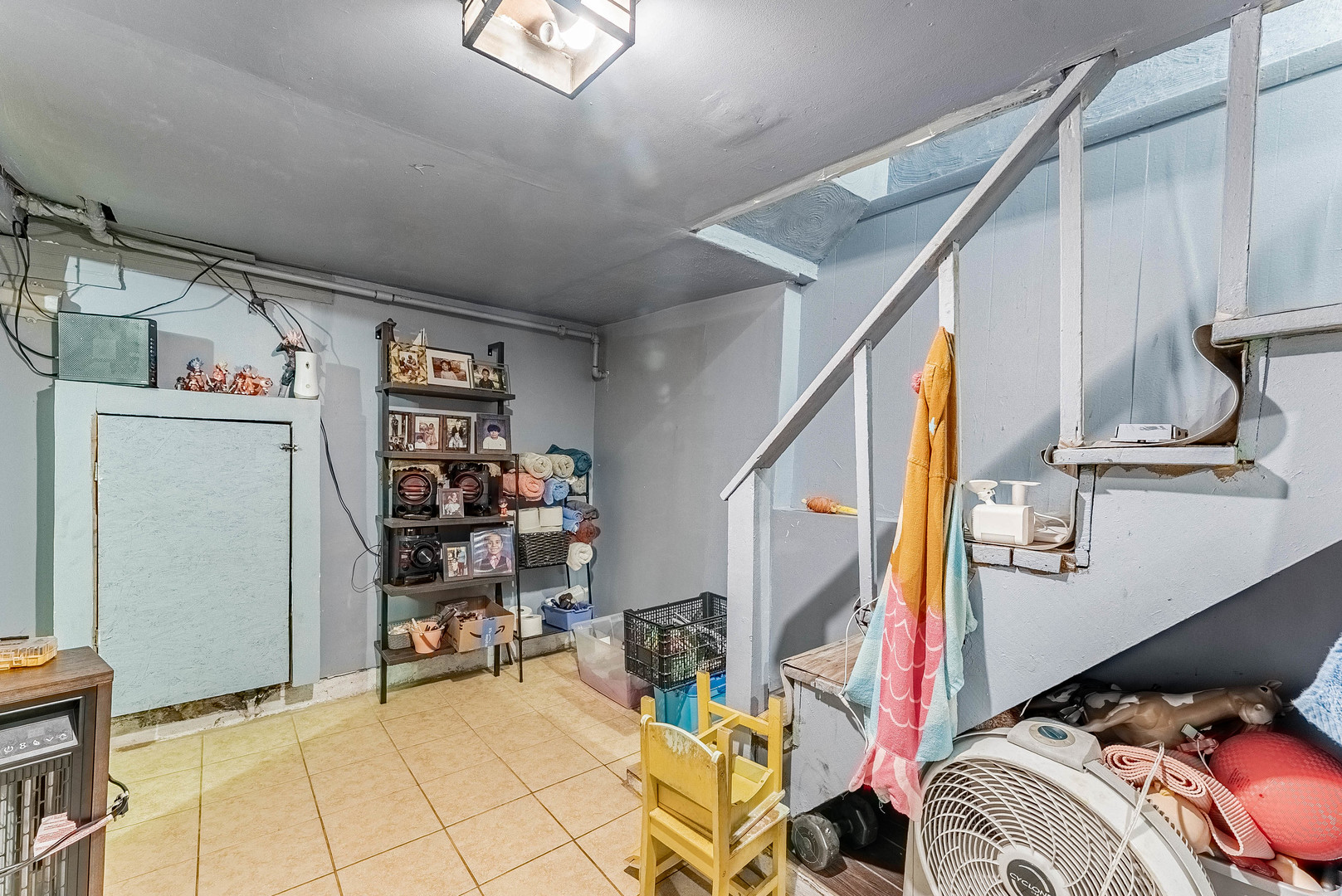 6933 South Michigan Avenue Chicago, IL 60637 - Photo 19 of 29 a view of walk in closet with clothes and shoes