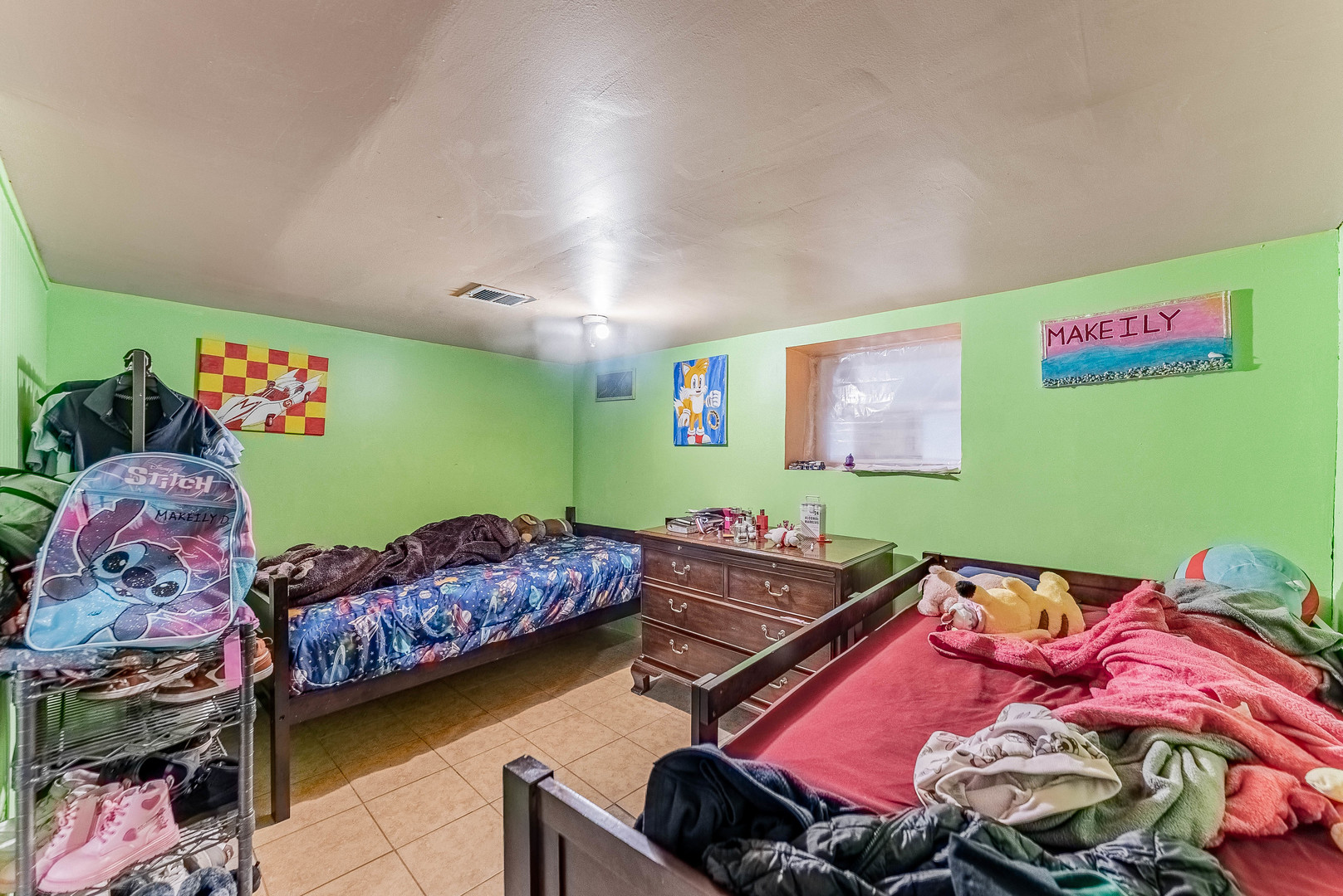 6933 South Michigan Avenue Chicago, IL 60637 - Photo 21 of 29 a bedroom with furniture and a bed