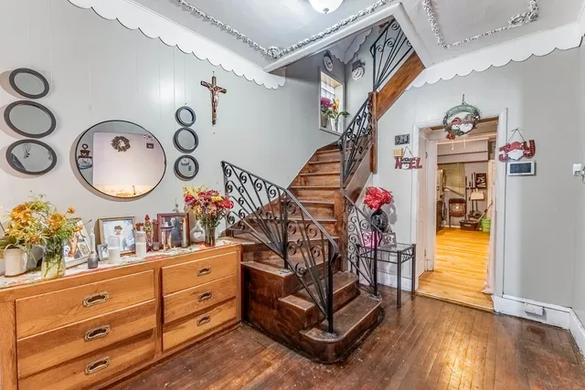 a kitchen with refrigerator cabinets and a sink