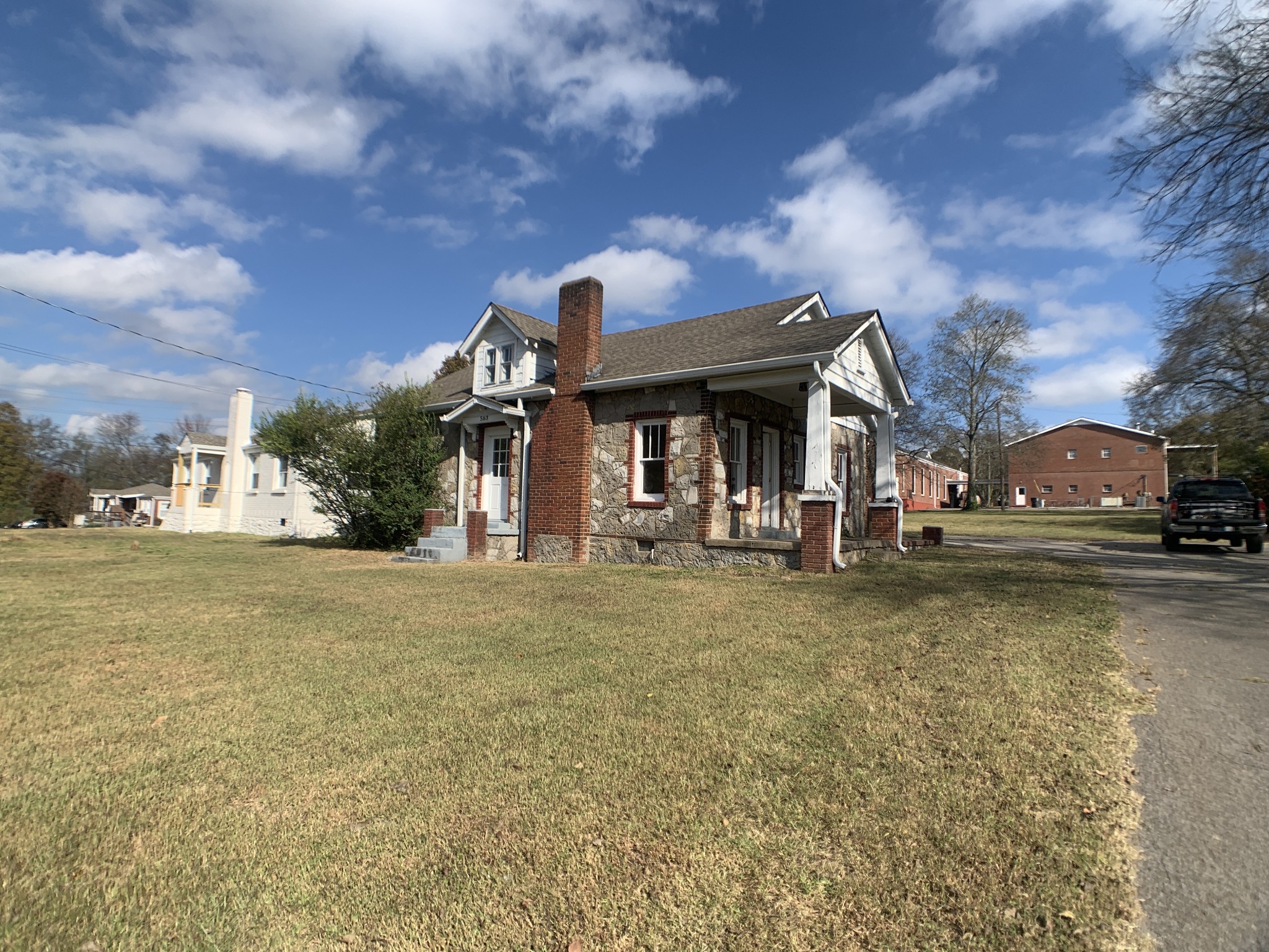563 Neelys Bend Road Madison, TN 37115 - Photo 1 of 13 a front view of a house with a yard