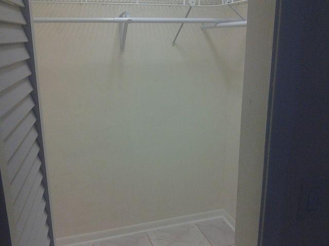 10965 Christopher Avenue Boca Raton, FL 33428 - Photo 12 of 25 a view of a room with racks on the wall