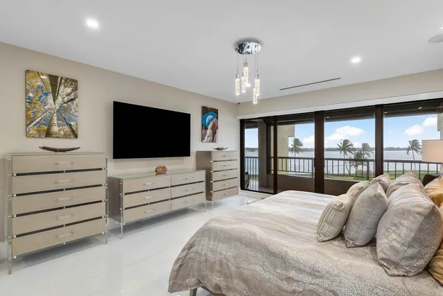 a view of a double vanity sink and mirror with in living room