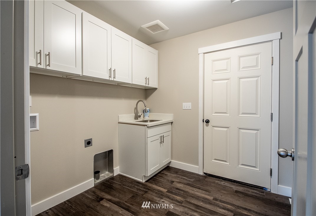 5031 East Rasor Road Belfair, WA 98528 - Photo 14 of 16 a view of cabinets with wooden floor