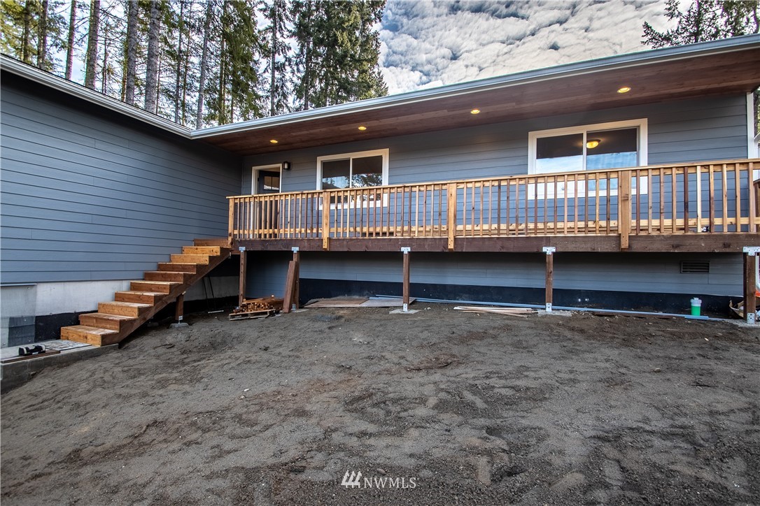5031 East Rasor Road Belfair, WA 98528 - Photo 16 of 16 a backyard of a house