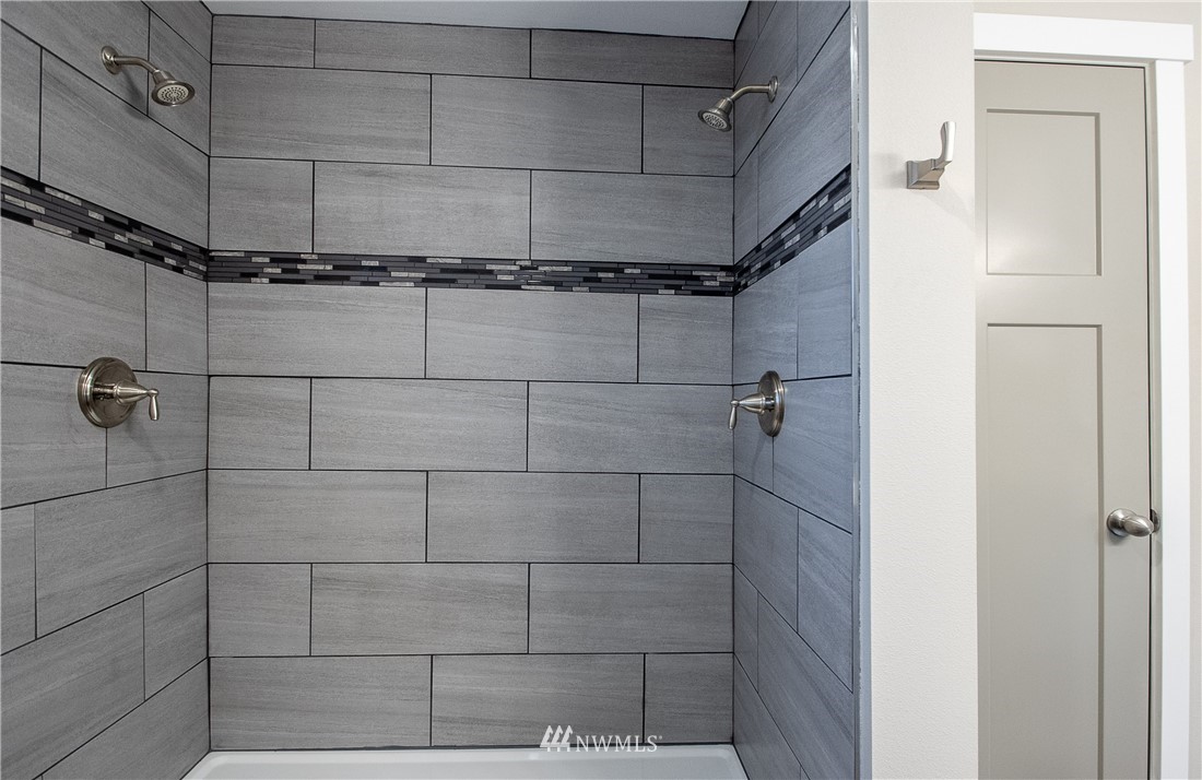 5031 East Rasor Road Belfair, WA 98528 - Photo 10 of 16 a bathroom with a shower