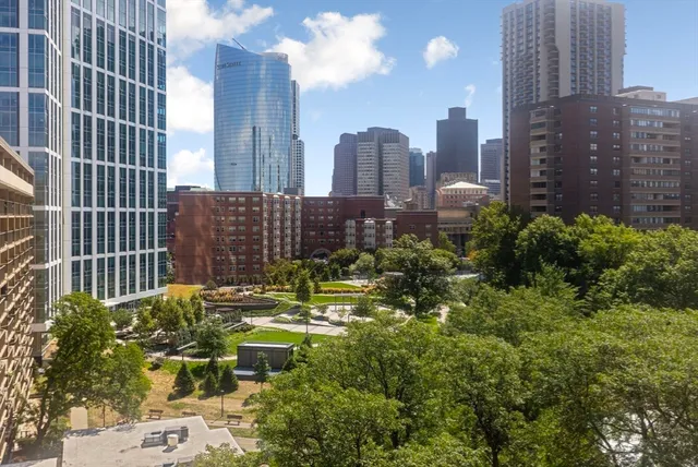 a view of a city with tall buildings