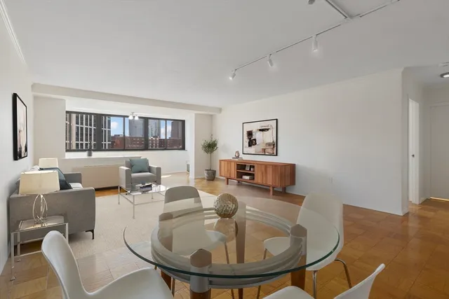 a view of a lake with a car parked on the terrace