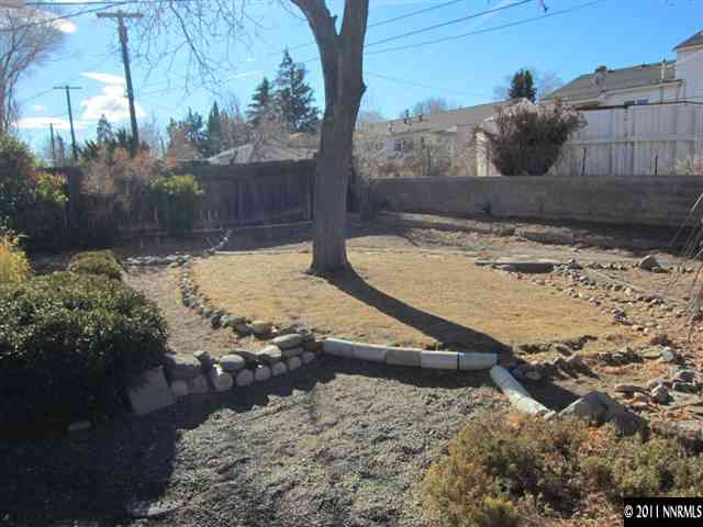 875 Lodge Avenue Reno, NV 89503 - Photo 12 of 13 a view of a yard with wooden fence