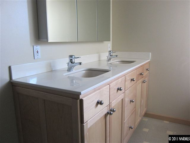 875 Lodge Avenue Reno, NV 89503 - Photo 10 of 13 a bathroom with a sink and a mirror