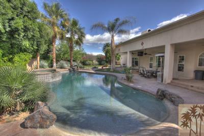 43094 Joshua Road Rancho Mirage, CA 92270 - Photo 20 of 25 a view of a swimming pool with outdoor seating