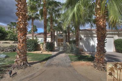 43094 Joshua Road Rancho Mirage, CA 92270 - Photo 2 of 25 a backyard of a house with lots of green space