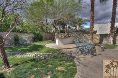 43094 Joshua Road Rancho Mirage, CA 92270 - Photo 24 of 25 a view of a garden with a fountain