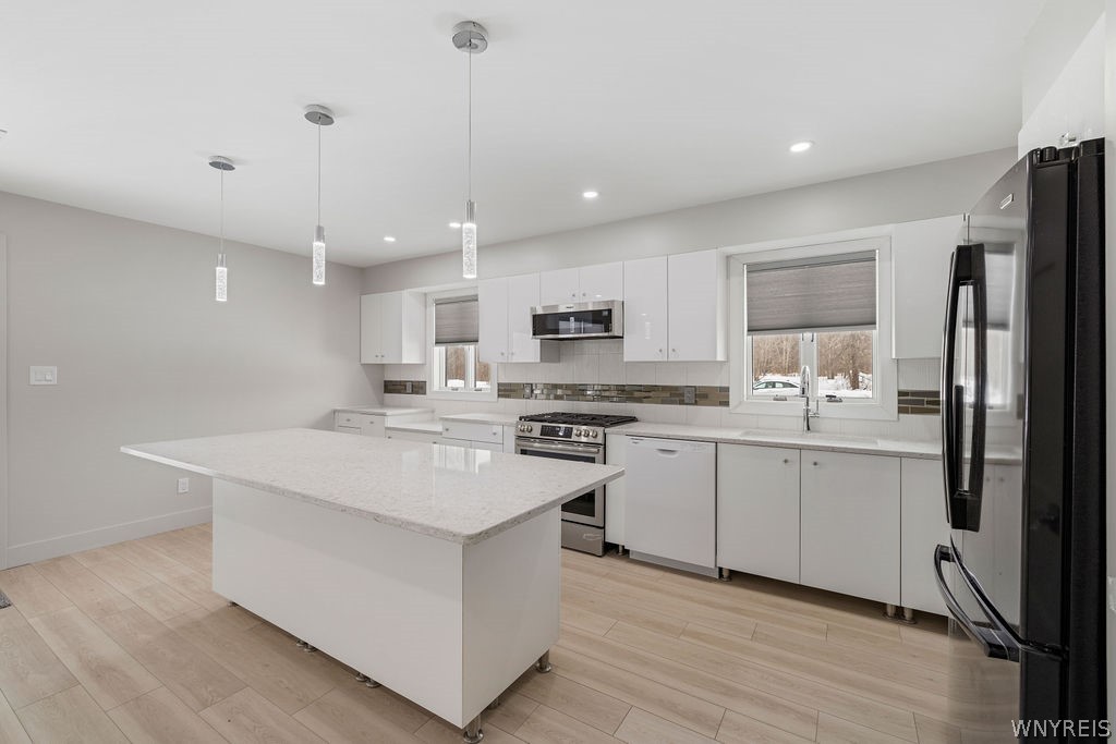 855 Madison Avenue Lewiston, NY 14092 - Photo 4 of 25 Impeccable kitchen with contemporary amenities