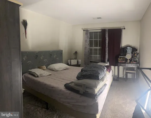 $230,000 | 8809 Stoneridge Circle, Unit 204, Pikesville, MD 21208