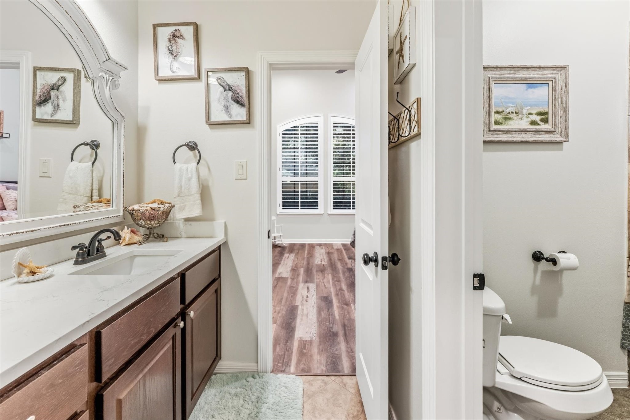 103 Fox Rindle Road Montgomery, TX 77316 - Photo 30 of 44 Stretch out for your morning routine with this expansive vanity topped with a statement mirror delivers an elegant focal point and abundant space for a polished daily routine.