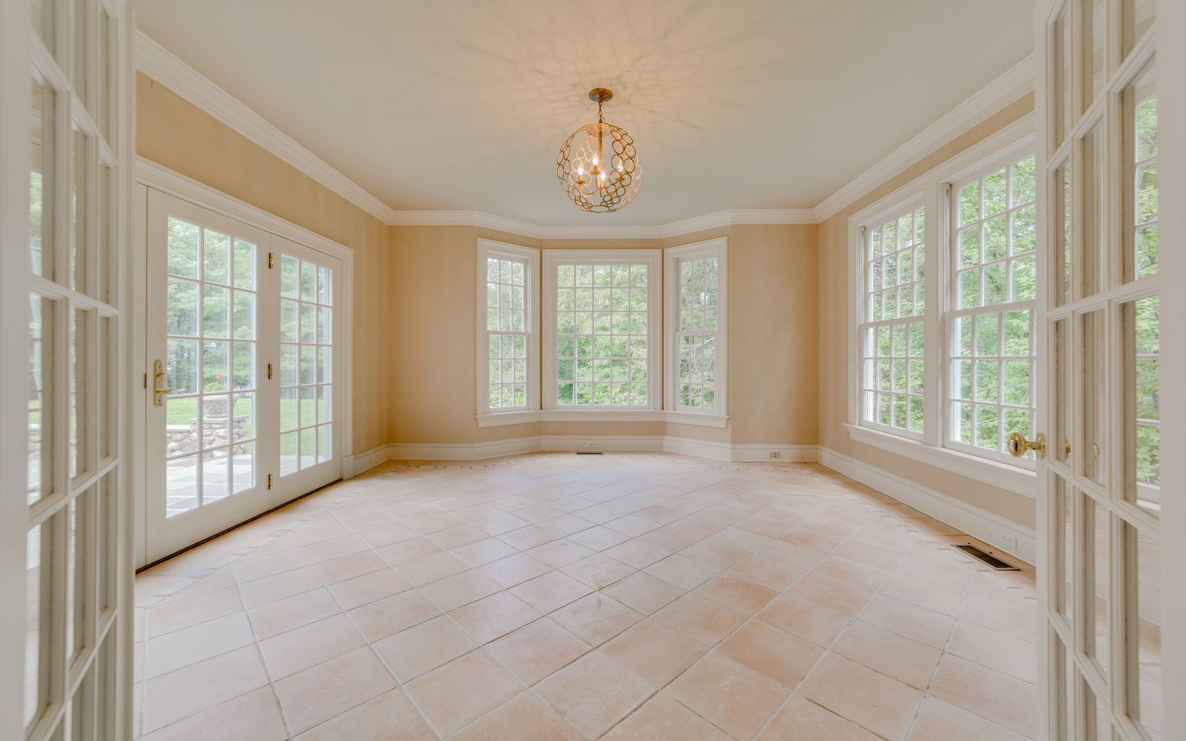 1601 Ponus Ridge Road New Canaan, CT 06840 - Photo 38 of 88 a view of an empty room with a window