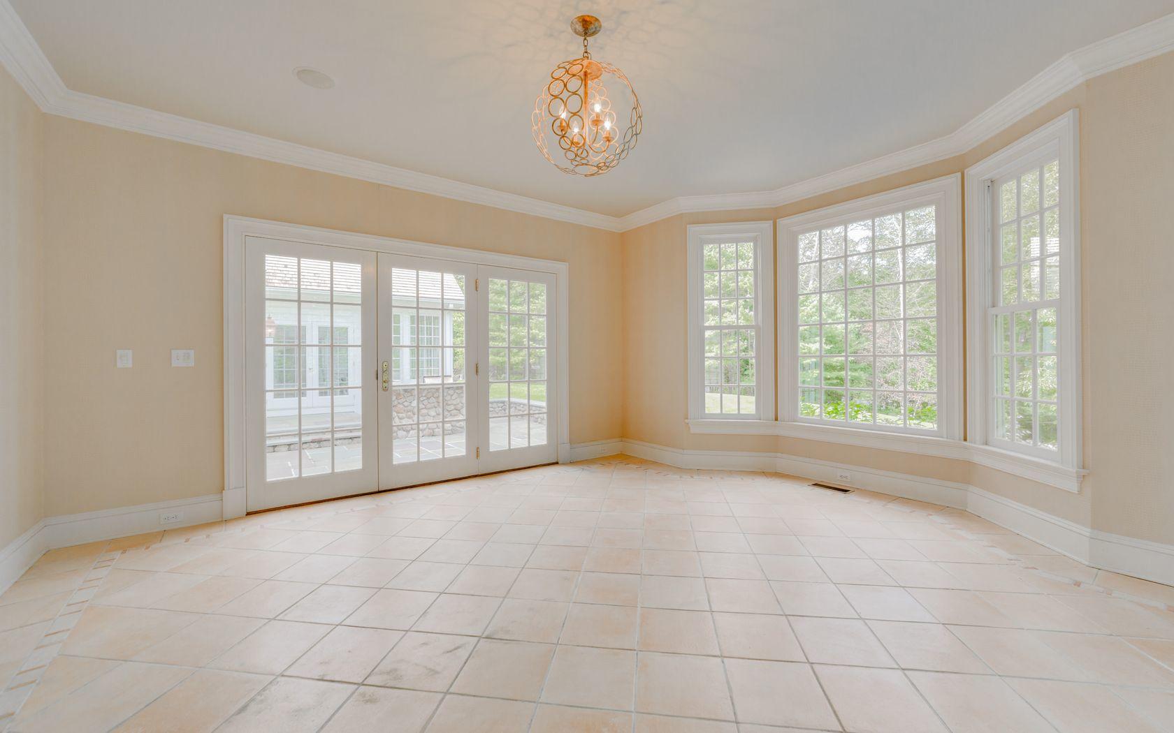 1601 Ponus Ridge Road New Canaan, CT 06840 - Photo 40 of 88 a view of an empty room with a window