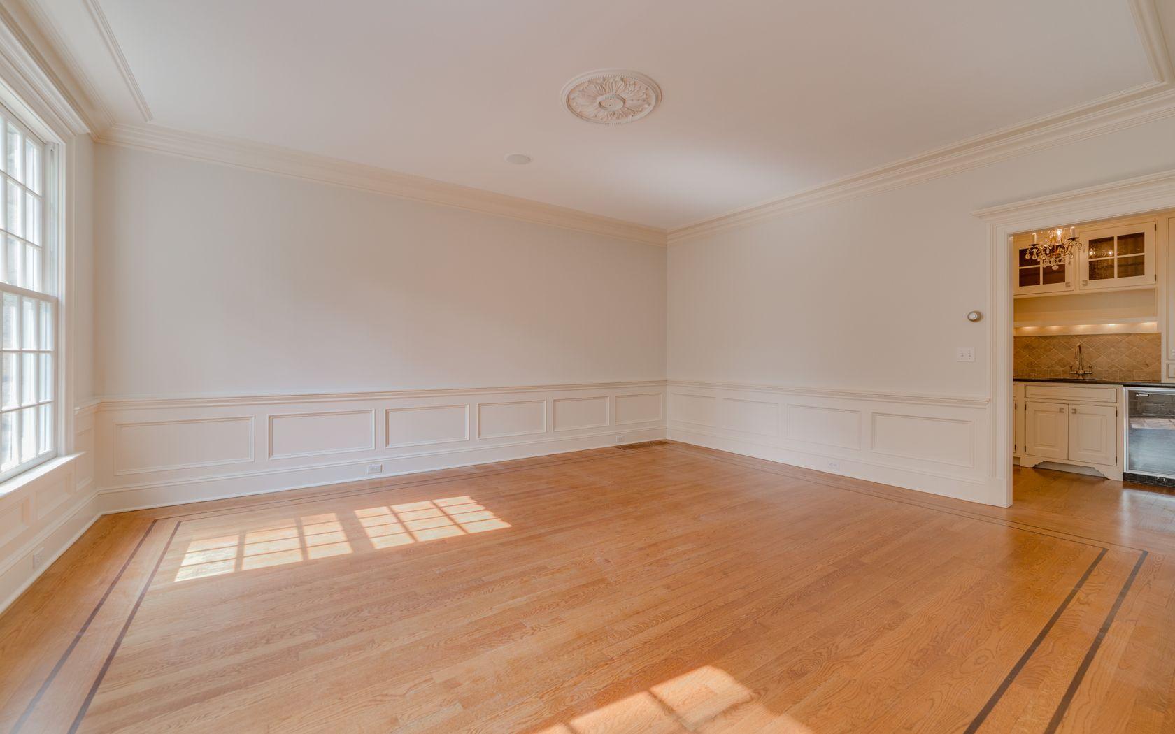 1601 Ponus Ridge Road New Canaan, CT 06840 - Photo 42 of 88 a view of empty room with wooden floor and fan