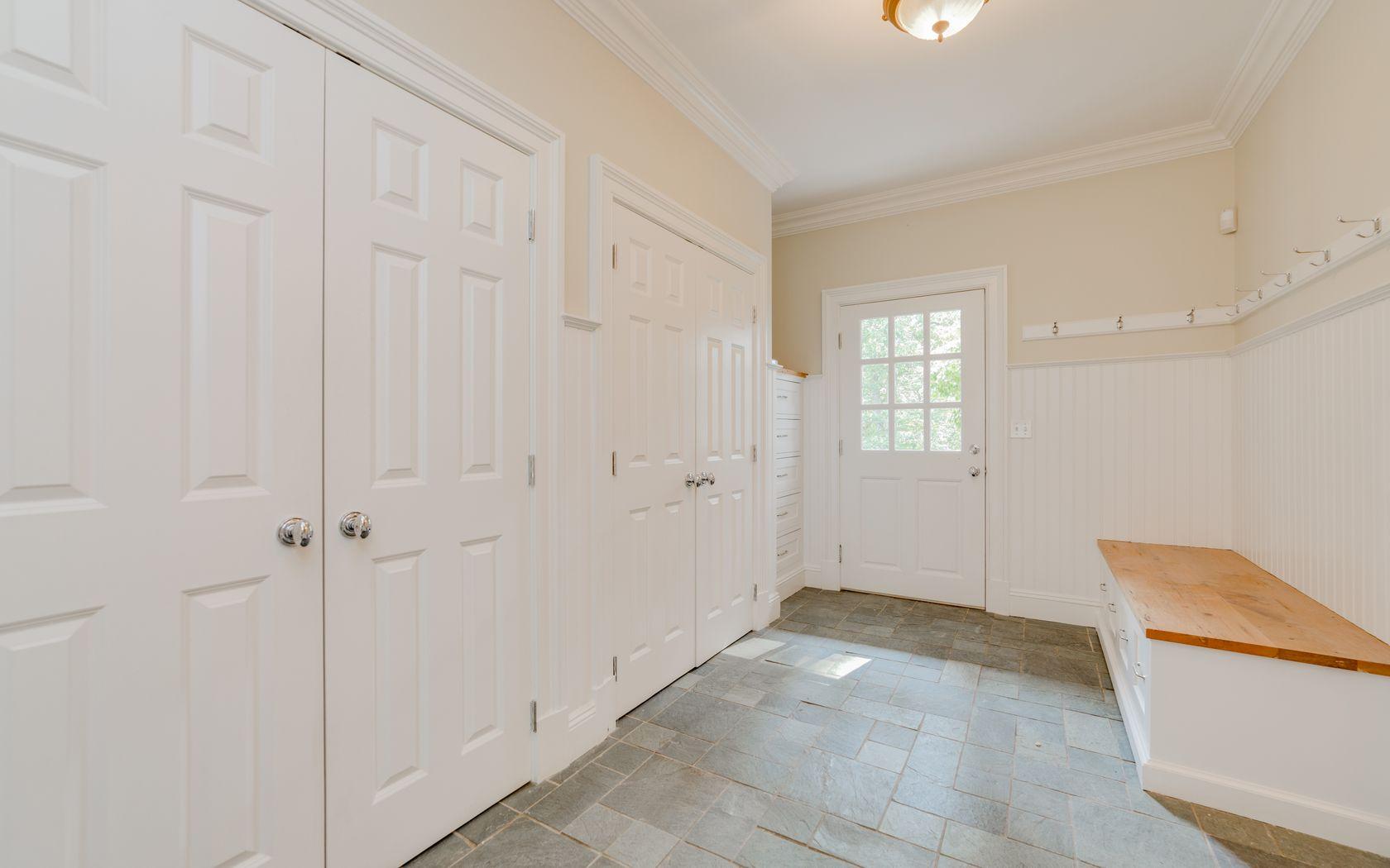 1601 Ponus Ridge Road New Canaan, CT 06840 - Photo 58 of 88 a view of a livingroom with an empty space and a window