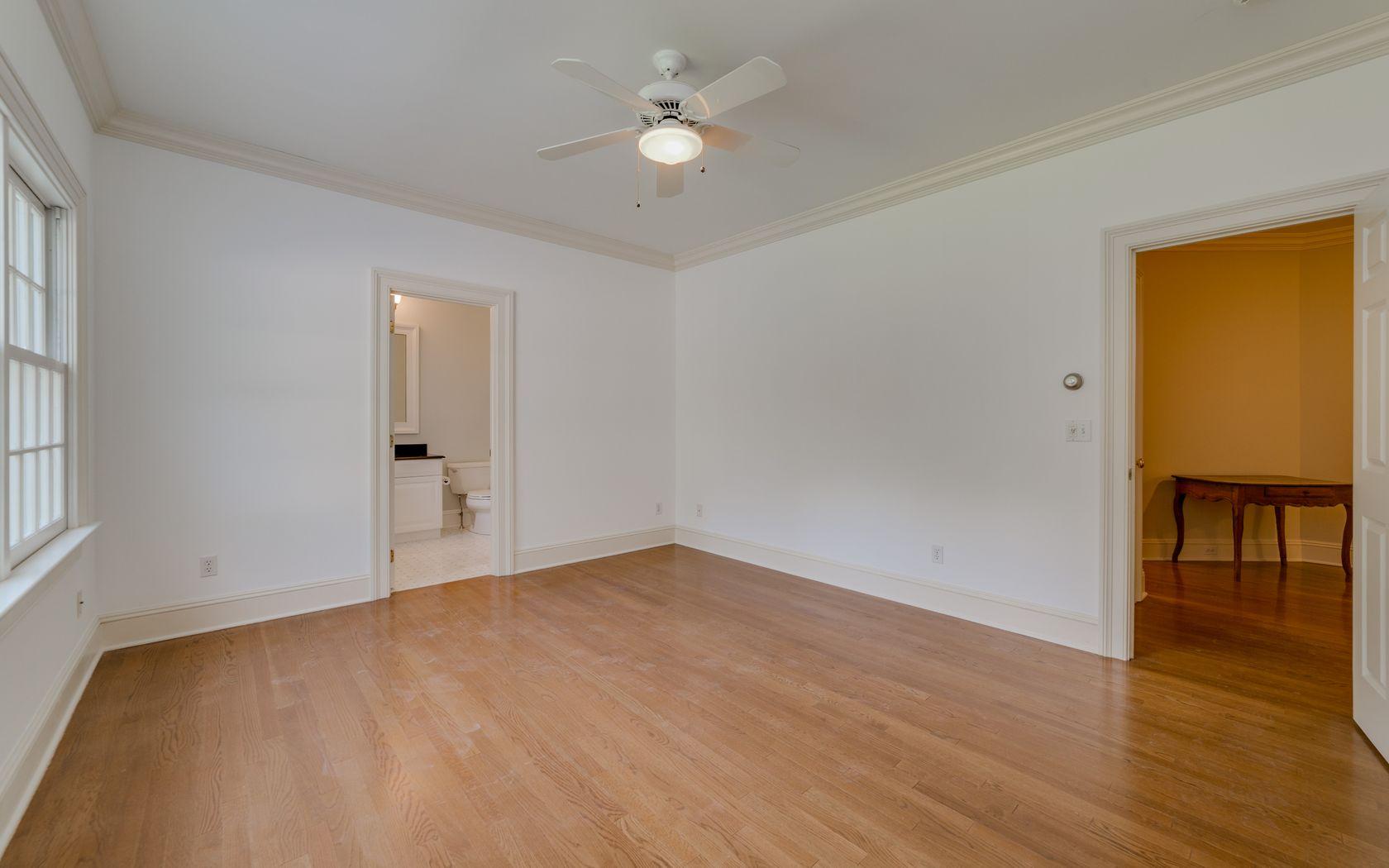 1601 Ponus Ridge Road New Canaan, CT 06840 - Photo 65 of 88 a view of empty room with wooden floor and fan