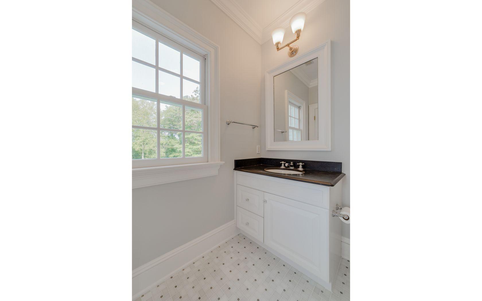 1601 Ponus Ridge Road New Canaan, CT 06840 - Photo 67 of 88 a kitchen with a sink and a window
