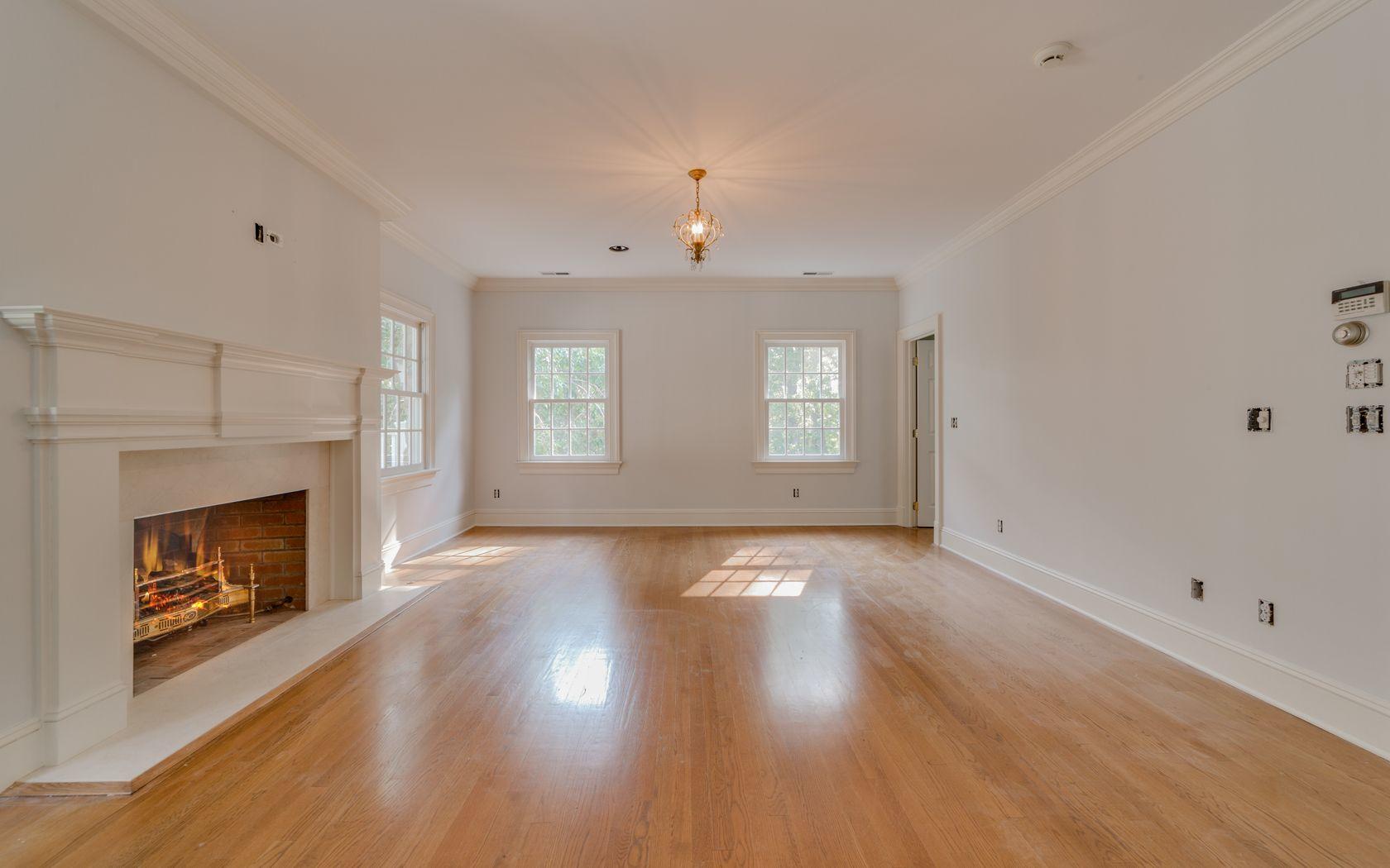 1601 Ponus Ridge Road New Canaan, CT 06840 - Photo 75 of 88 a view of an empty room with window and fire place