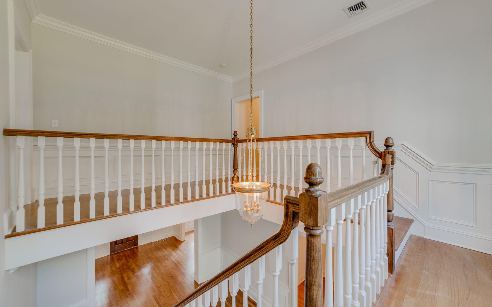 1601 Ponus Ridge Road New Canaan, CT 06840 - Photo 77 of 88 a view of staircase with railing and white walls