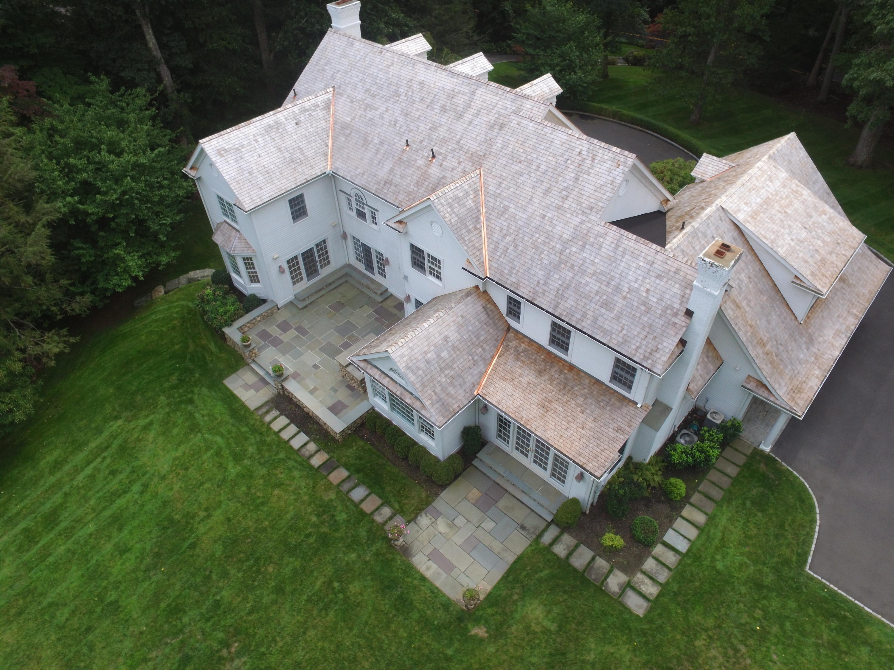 1601 Ponus Ridge Road New Canaan, CT 06840 - Photo 87 of 88 an aerial view of a house with a garden