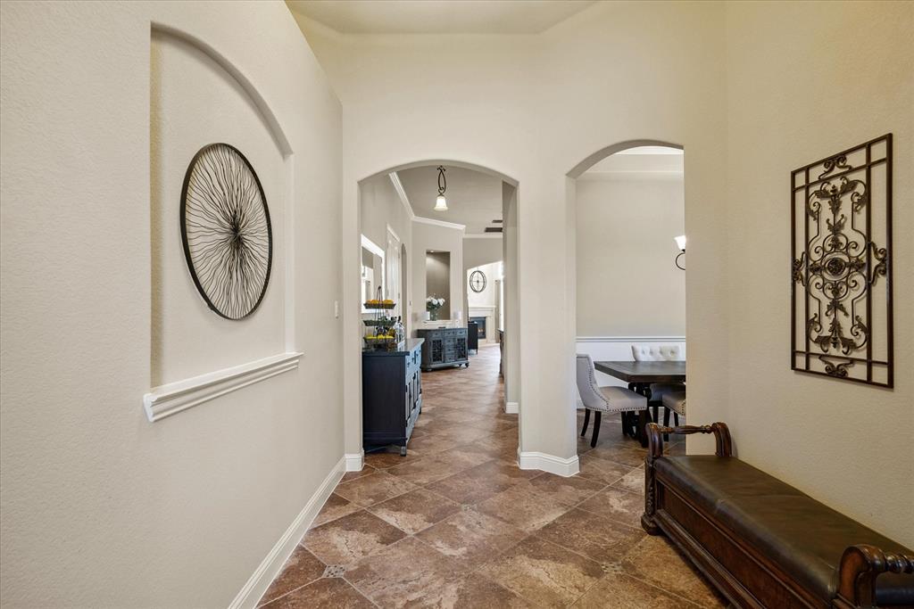1007 Somerset Circle Forney, TX 75126 - Photo 19 of 34 a view of a livingroom with furniture and a swimming pool