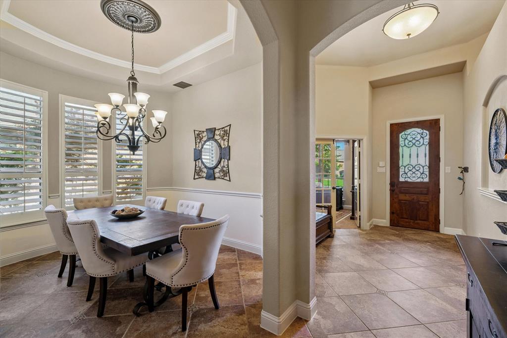 1007 Somerset Circle Forney, TX 75126 - Photo 21 of 34 a dining room with furniture and window