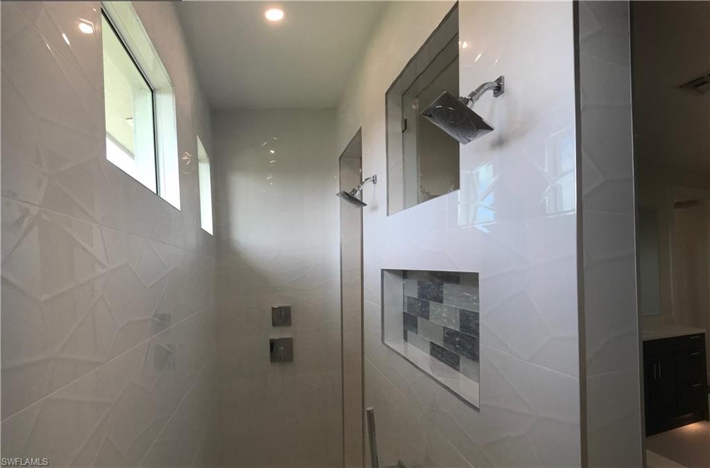 799 104th Avenue North Naples, FL 34108 - Photo 16 of 22 a view of walk in closet
