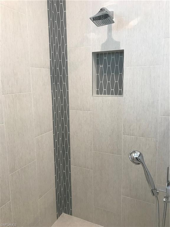799 104th Avenue North Naples, FL 34108 - Photo 18 of 22 a bathroom with a shower